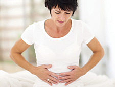 Woman with Stomach Pain